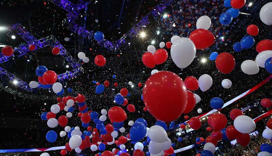 political convention red white and blue balloon drop in an arena