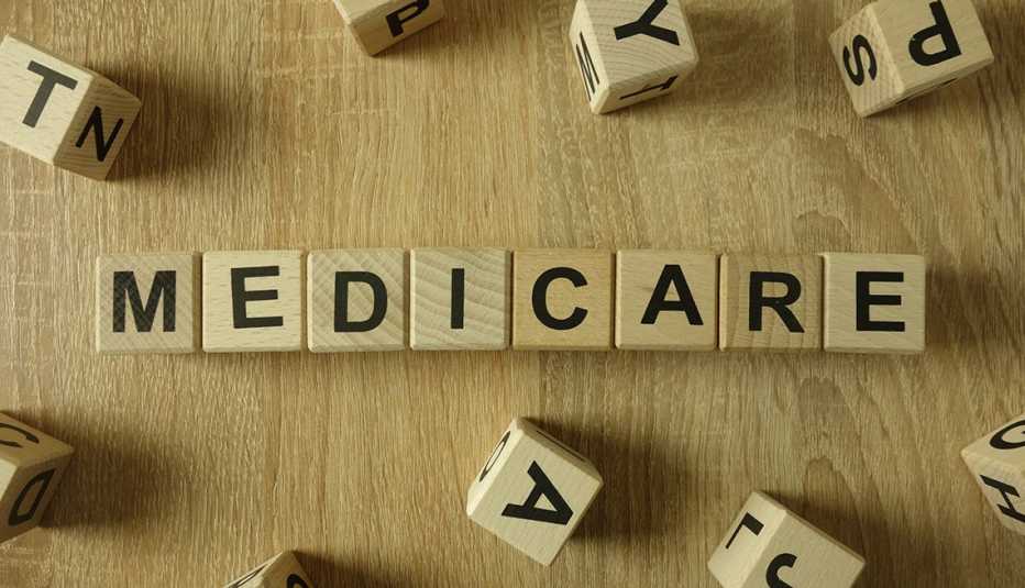 wooden blocks printed with letters spell out the word medicare