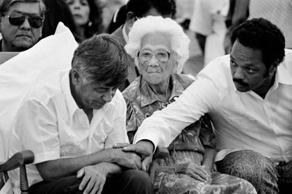 UFW president César Chávez, his mother Juana Estrada Chávez, and the Rev. Jesse Jackson at the Mass during which Chávez ended his 36-day Fast for Life, in 1988. Jackson, in solidarity, embarked on his own three-day fast on that day.