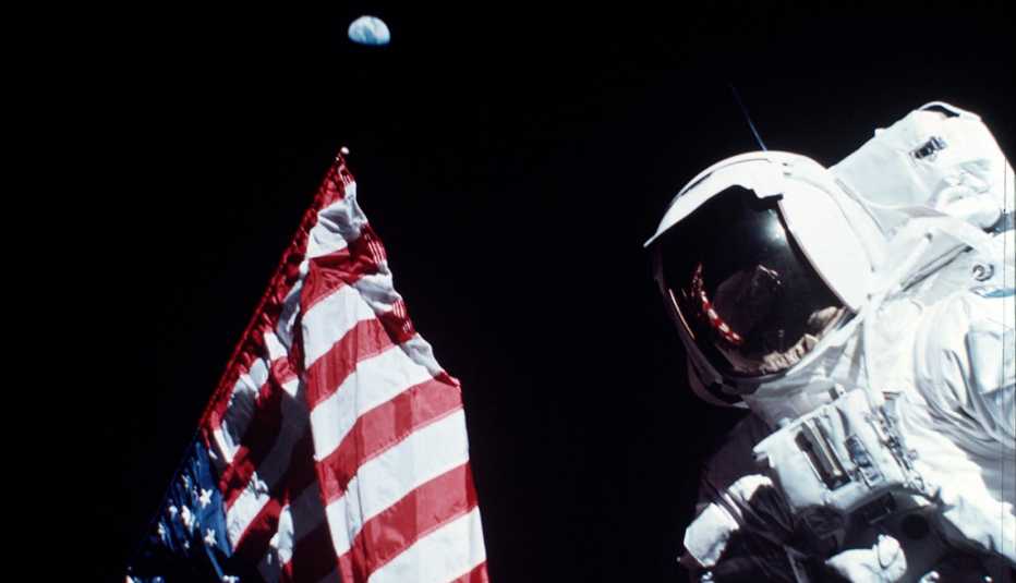 Astronaut Jack Schmitt with the American flag on the moon