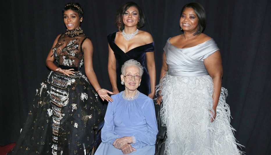 Janelle Monae, from left, Taraji P. Henson, and Octavia Spencer pose with Katherine Johnson, seated, backstage at the Oscars