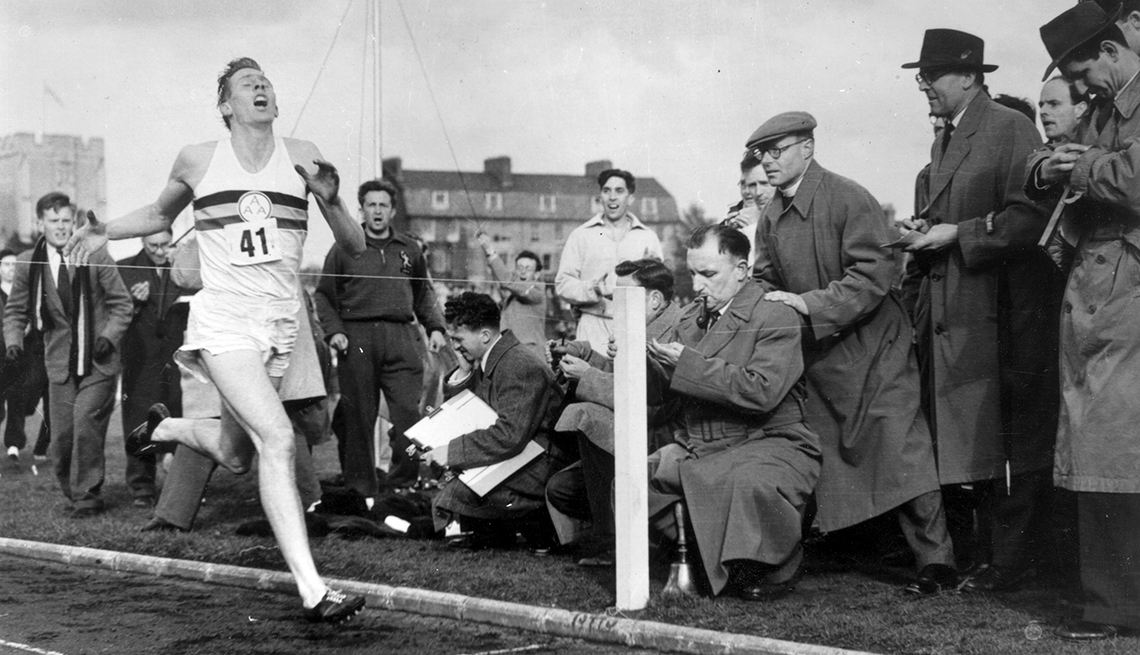 Roger Bannister crossing finish line in track race
