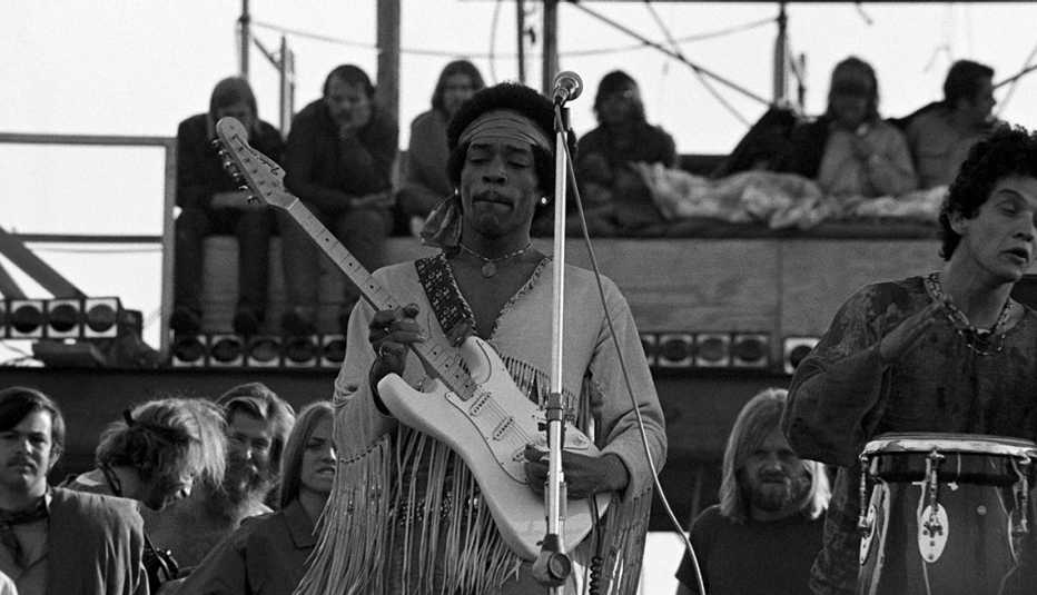 Jimi Hendrix performing his legendary 2 hour performance at Woodstock Music & Arts Festival held on Sam Yasgur's alfalfa field in Sullivan County in Bethal, New York on August 18, 1969. Hendrix insisted he close the festival
