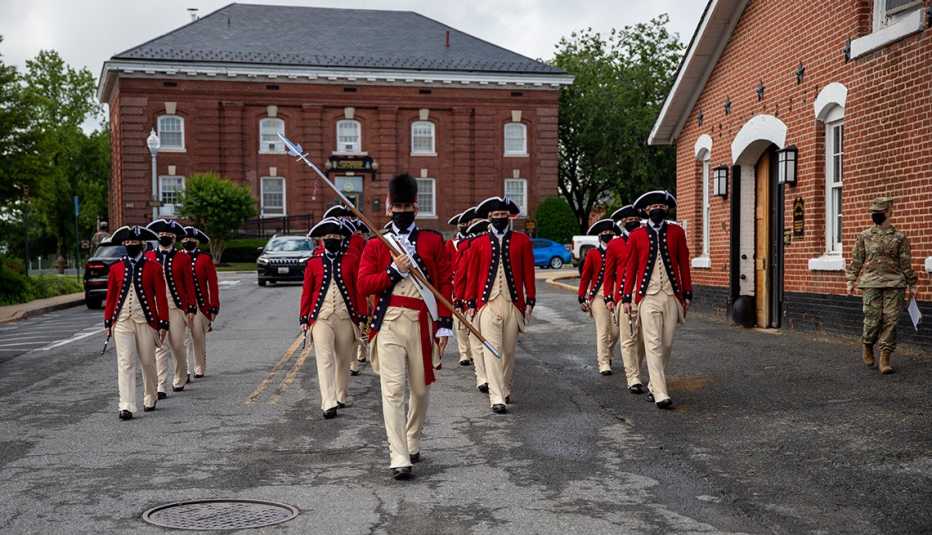 united states army soldiers in training practice in formation for the old guard fife and drum corps