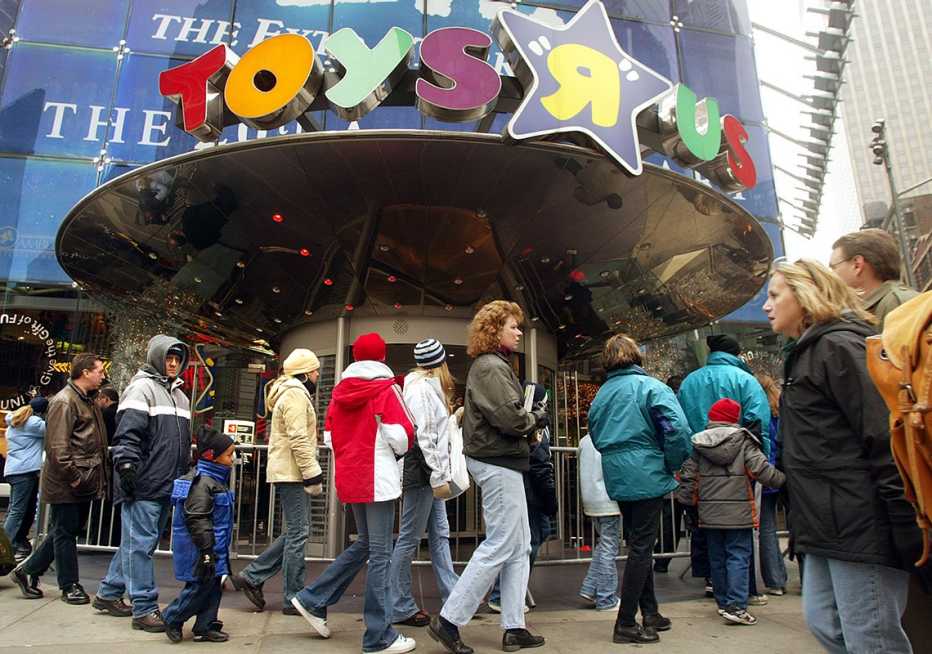 People shopping at a Toys R Us