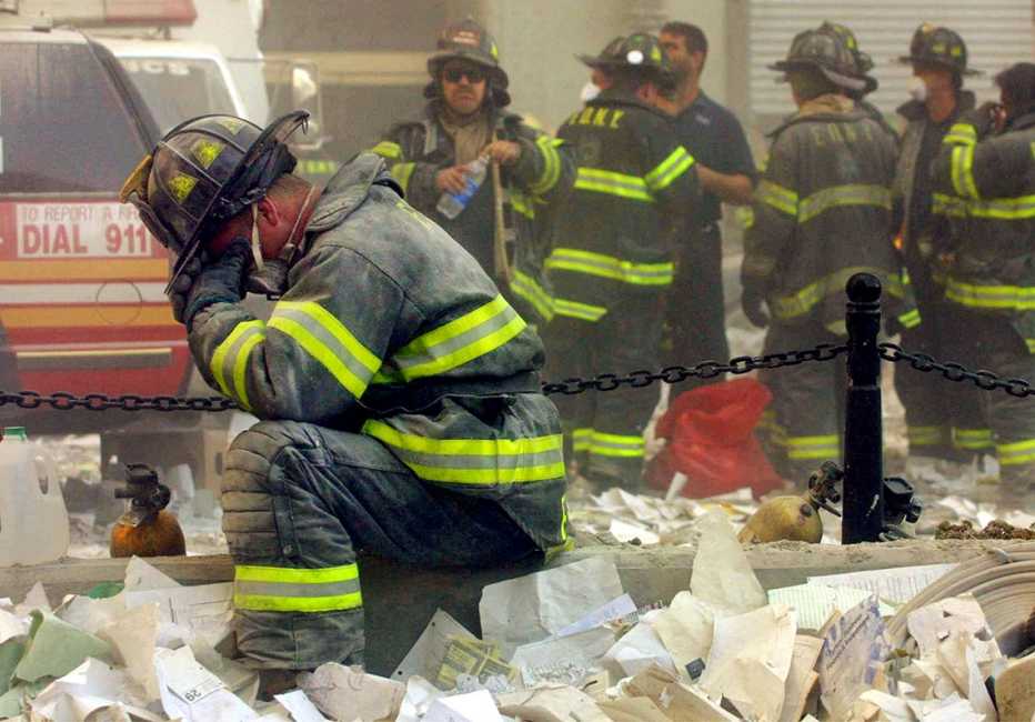 a ground zero a firefighter prays