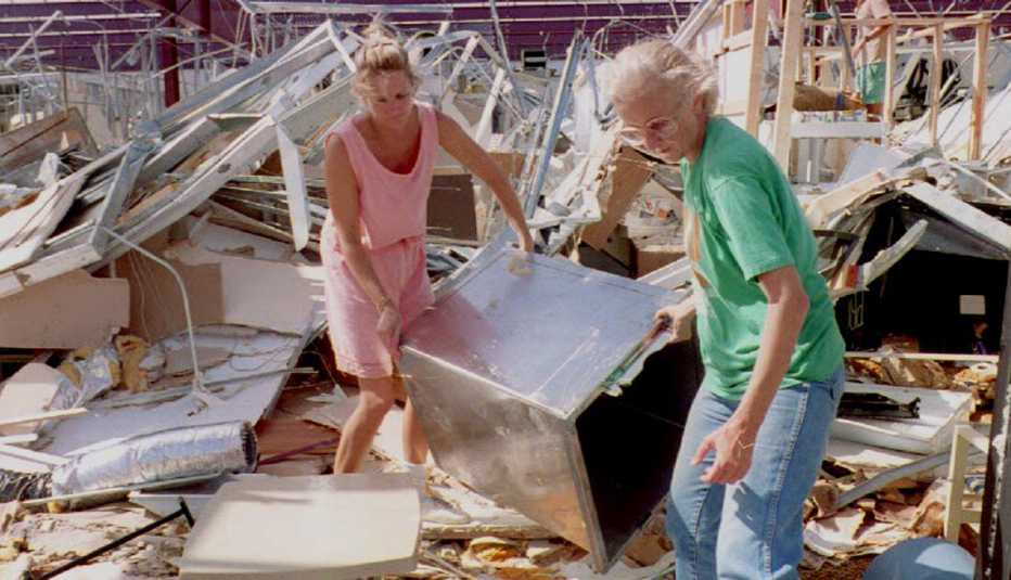 two women clear rubble from their pet supply store in homestead florida after hurricane andrew