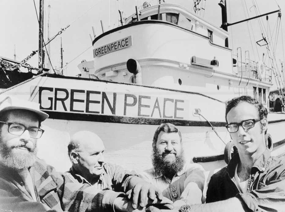 early photo of greenpeace activists and their first boat