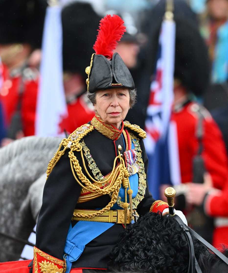 Princess Anne, Princess Royal rides on horseback behind the gold state coach carrying the newly crowned King and Queen Consort as they travel down The Mall. 
