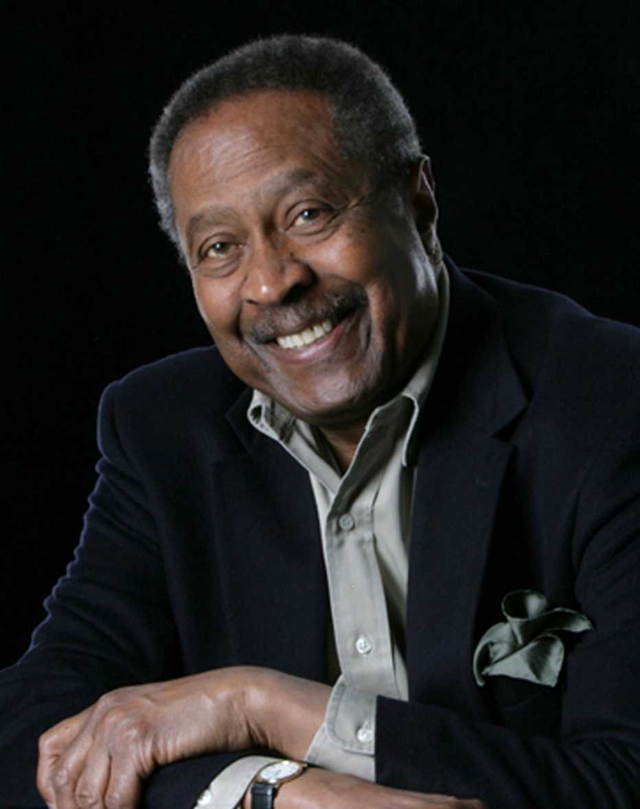 clarence jones poses for a photo in this headshot