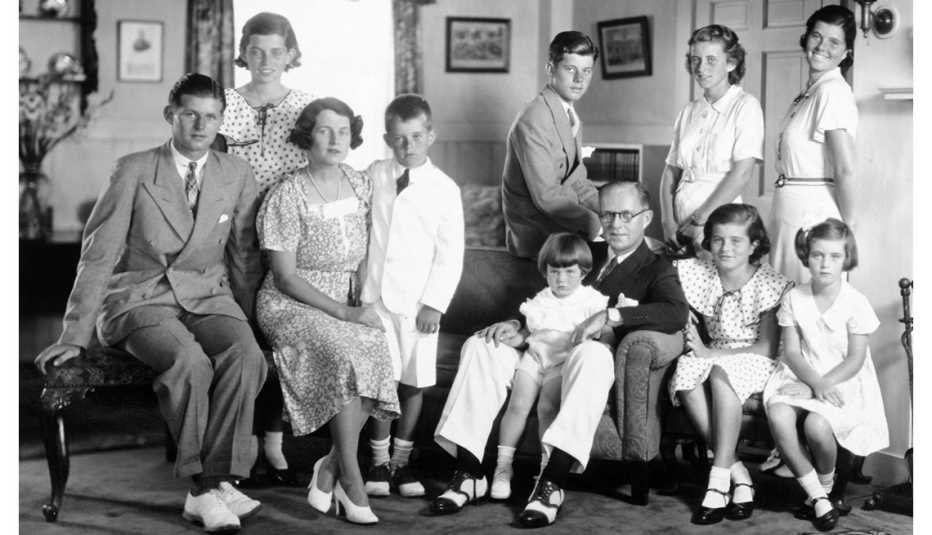Portrait of the Kennedy family in their living room, Brookline, Massachusetts, 1930s.