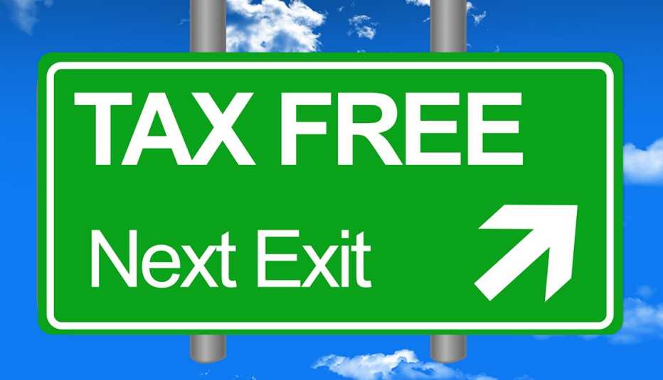 illustrated road sign says Tax Free, Next Exit and has an arrow pointing the way