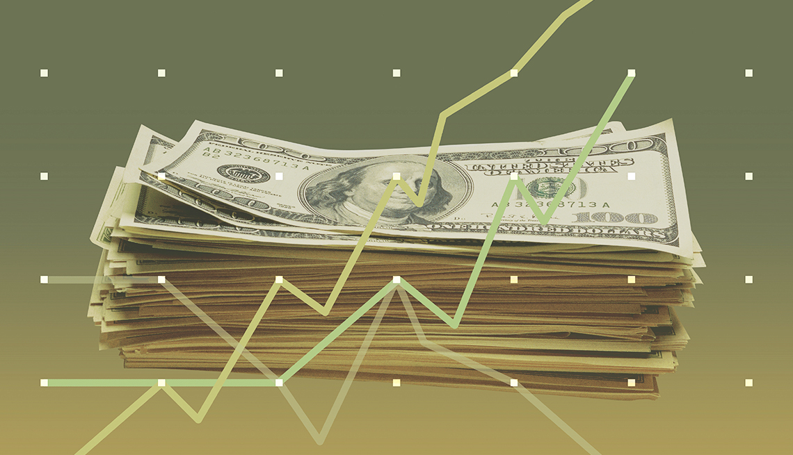 A stack of green cash on a green background behind layers of green graph points and line charts