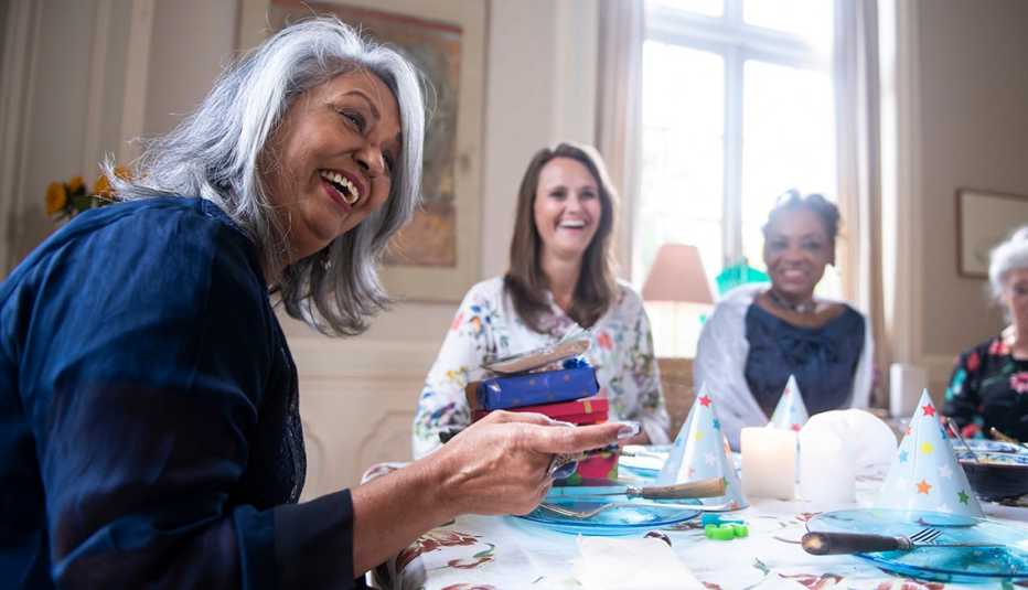 older woman celebrating her birthday with girlfriends