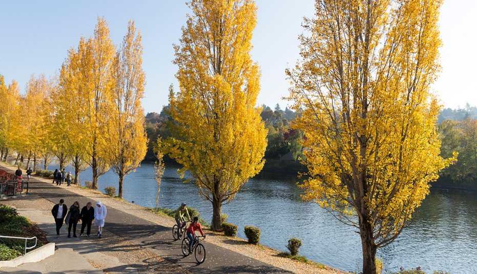 Seattle, Washington: Visitors enjoy fall color along the Burke-Gilman Trail in the Fremont neighborhood.