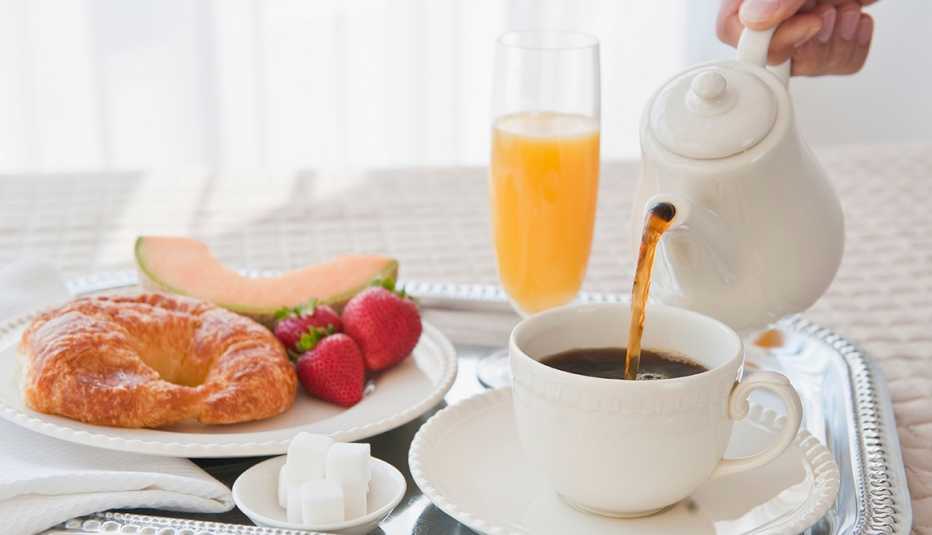 Breakfast Tray with Croissant, Fruit, Orange Juice and Hot Coffee, Hotel Chains Free Breakfast