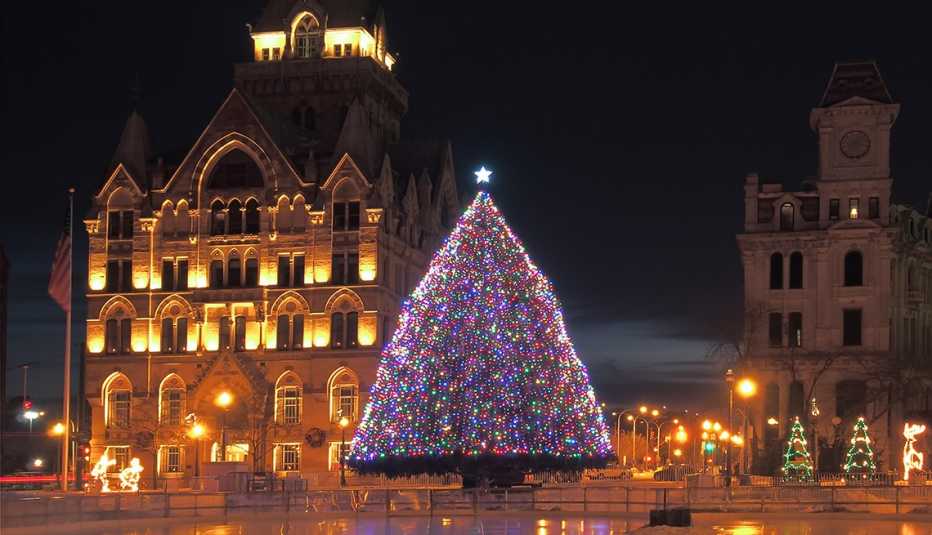 View of Clinton Square with the city Christmas tree at night in downtown Syracuse, New York