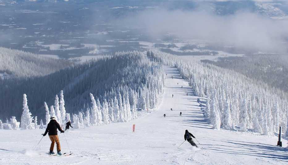 People skiing in Schweitzer Idaho on a winter day.