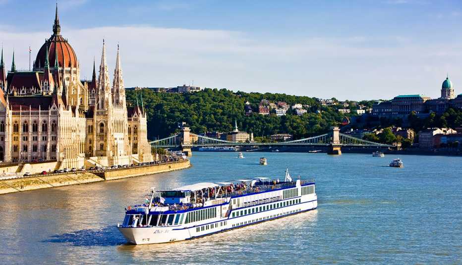 Cruise ship passing the Parliament on the Danube, Budapest,