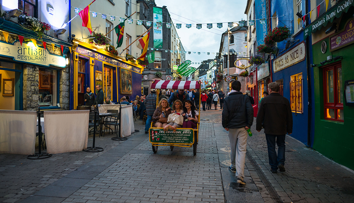 tourists walking along Galway, Ireland