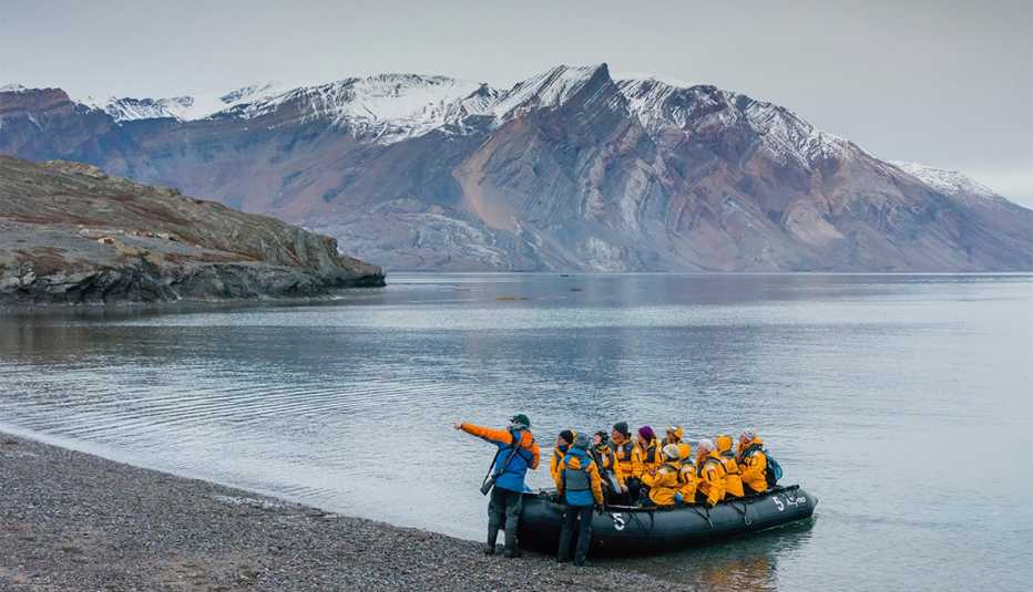 visitors touring Northeast Greenland National Park from a small boat