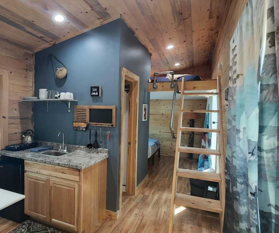 the interior showing the kitchenette of a WeeCasa Tiny House Resort
