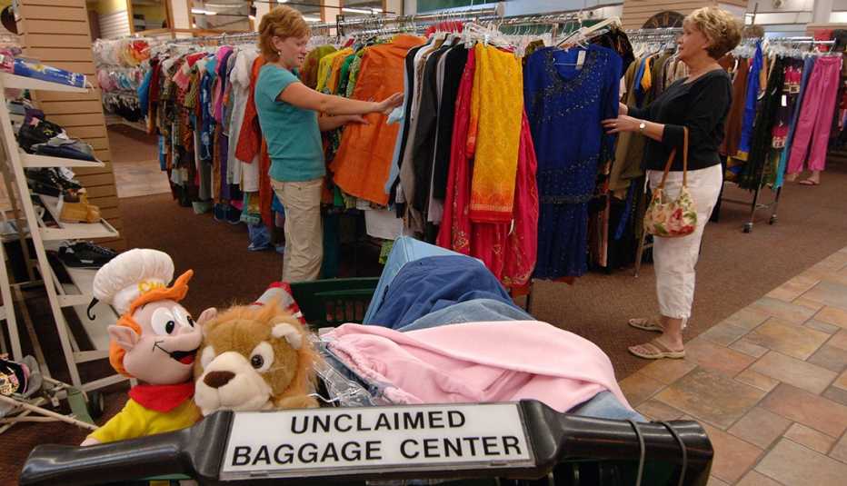 women shopping at an unclaimed baggage center