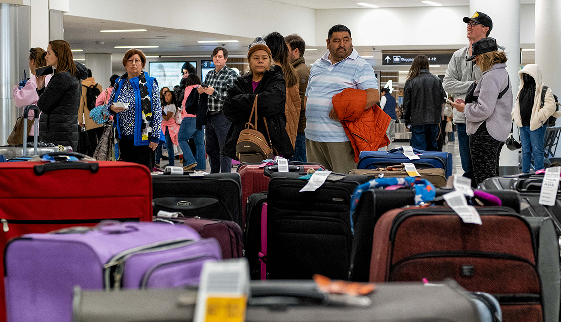 Passengers at baggage at Nashville International Airport after their flights on Southwest Airlines were cancelled