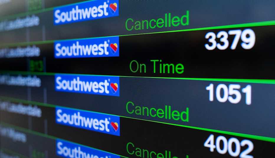arrival and departure board at BWI showing canceled Southwest flights
