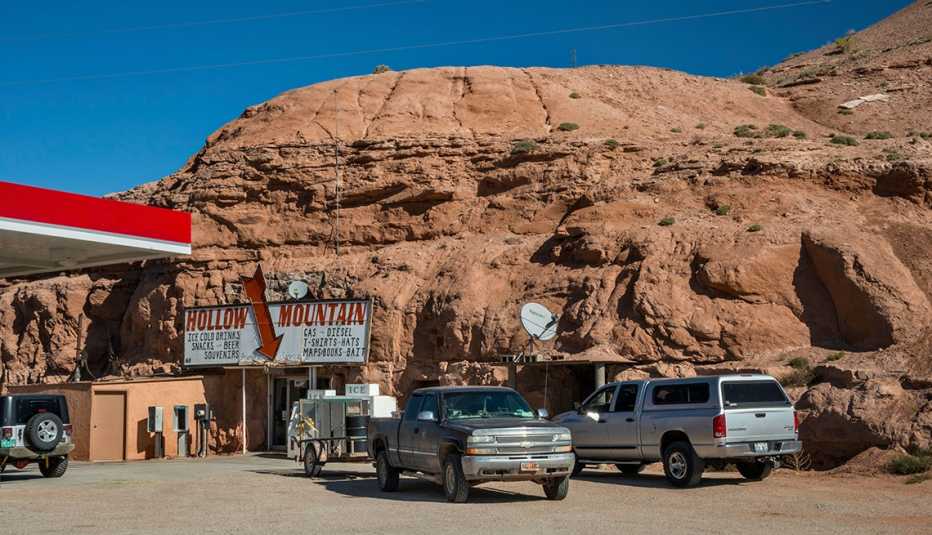 trucks rest outside hollow mountain gas station and restaurant in utah