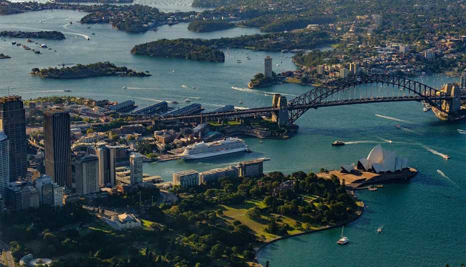 Aerial view of the Viking Sun near the Harbour Bridge and Opera House, Sydney, Australia.