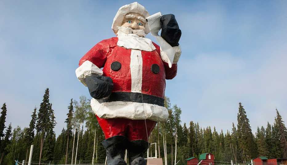 Roadside Santa statue in the Christmas themed town of North Pole, Alaska, Towns That Celebrate Christmas Year-Round