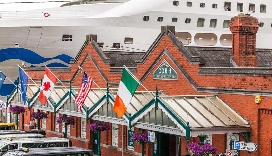 The heritage centre on the sea front with the cruise ship Sea Princess docked at the quayside in Cobh, Co. Cork, Ireland. Credit: David Creedon/Alamy Live News