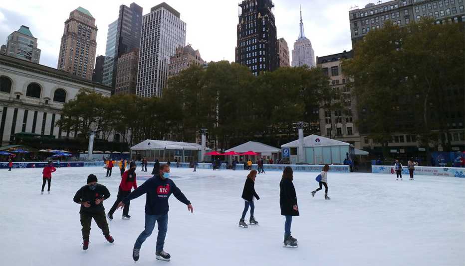 People skate at the annual Winter Village in Bryant Park 