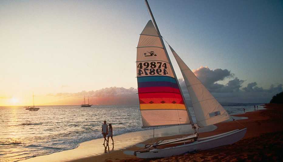 a catamaran on a beach at kaanapali