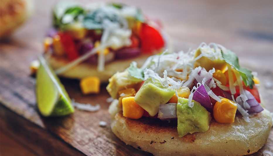 Colombian Vegetarian Arepas with Paprika, Corn, Tomato, Onion and Avocado