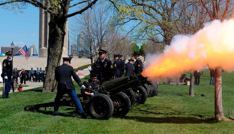 Members of the US Army's D Battery, First of the 129th Field Artillery unit, the same unit that President Harry S. Truman Commanded, fire a salute from their 75mm Howitzer during the centennial of the US entry into World War I at the National World War I 