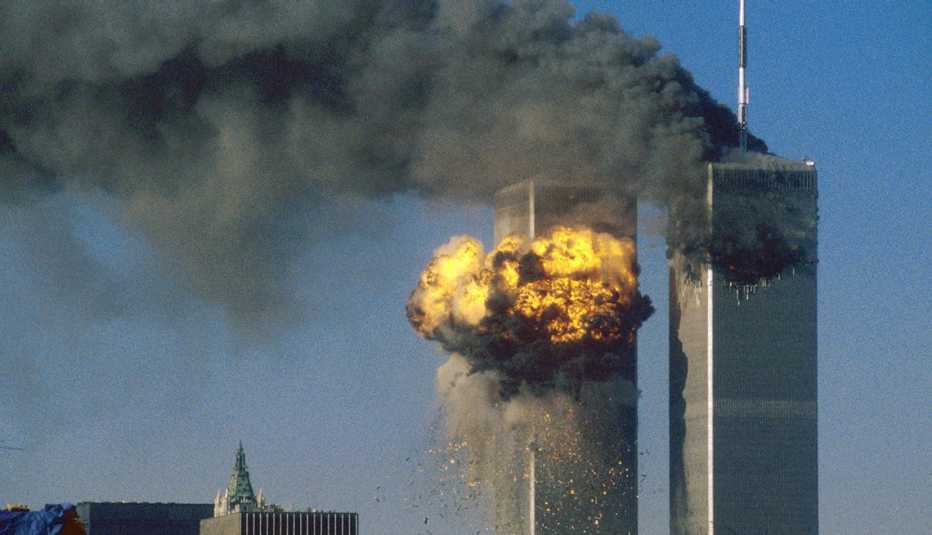 the attack on the world trade center show both towers struck and burning