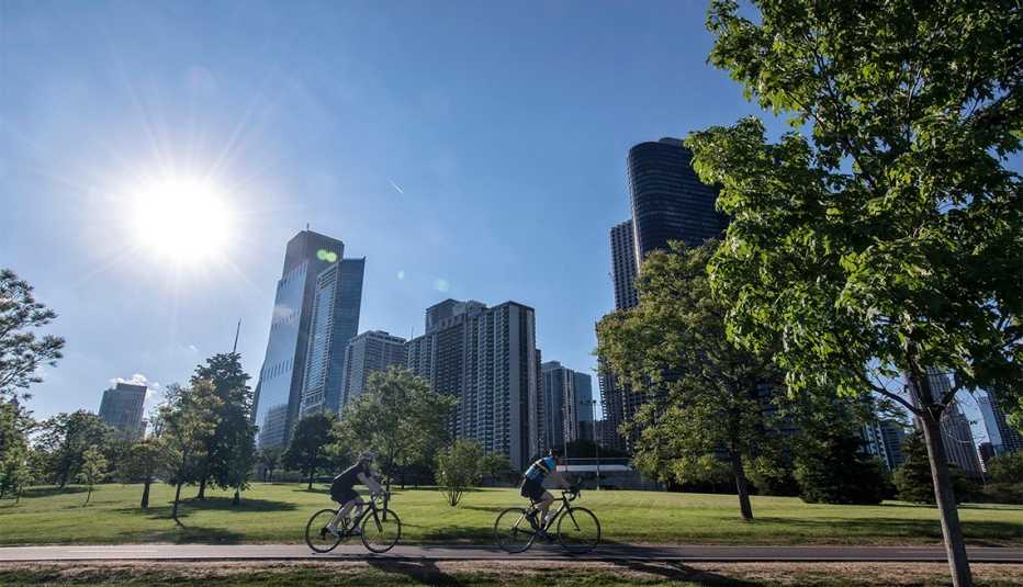 Bicycle riders on Lakefront Trail with the Chicago skyline