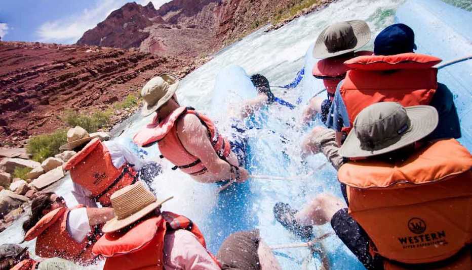 group of people white water rafting in the Grand Canyon