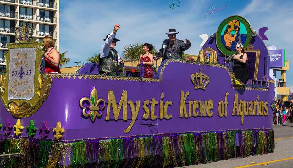 Mardi Gras revellers on parade floats in Galveston, Texas