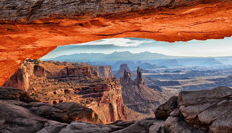sunrise seen from under mesa arch in canyonlands national park