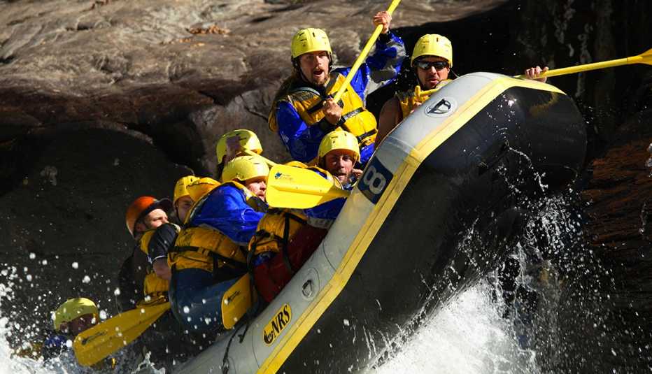Whitewater rafters crash through the Pillow Rock rapid on the Upper Gauley river near Fayetteville, West Virginia.