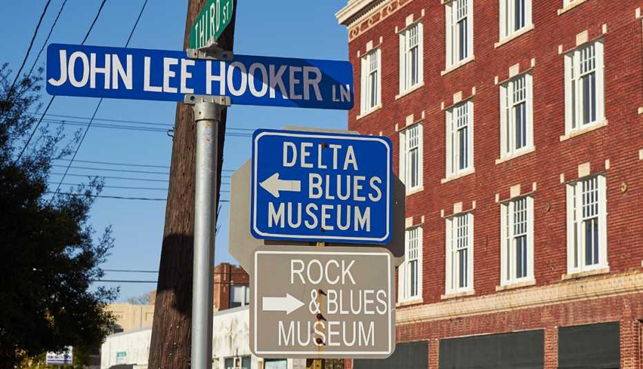 Street corner with rock and blues related signs, Clarksdale, Mississippi, USA