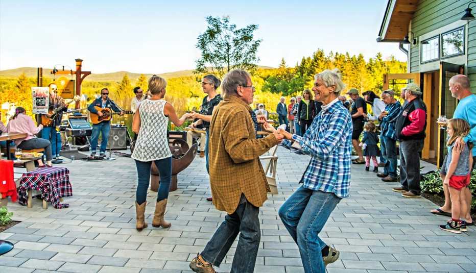 people dancing at a hill farmstead brewski in greensboro bend