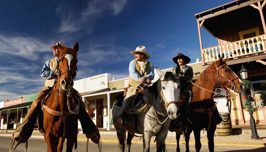 3 men on horses in Tombstone