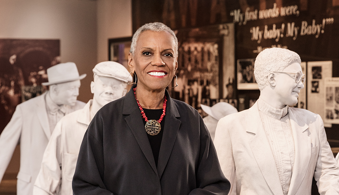Andrea L. Taylor, CEO of the Birmingham Civil Rights Institute, in front of a museum exhibit