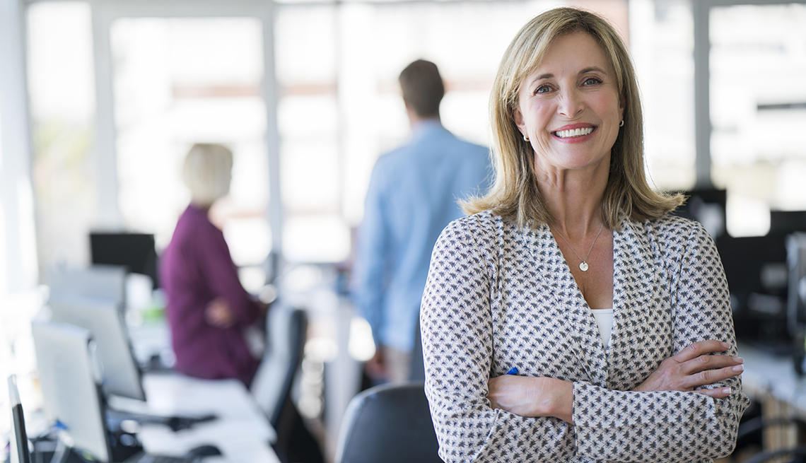 businesswoman smiling in an office