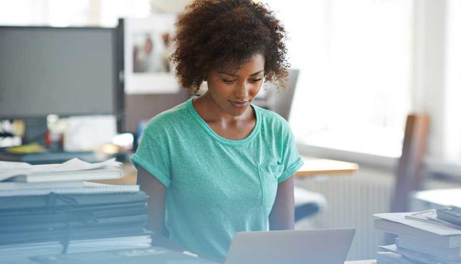 African-American Woman on Laptop, LinkedIn Profile Tips, Job Search