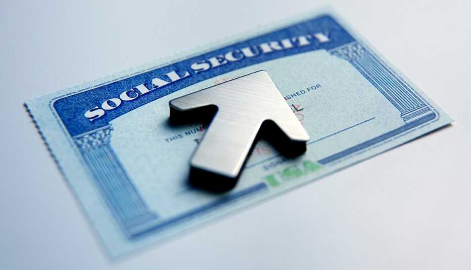 Social Security card with an arrow on top of it pointing up